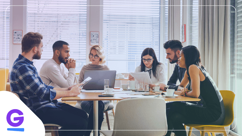 The Ultimate Interactive Meeting Playbook: How to Host Truly Engaging Meetings Team participating in dynamic activities during an interactive meeting